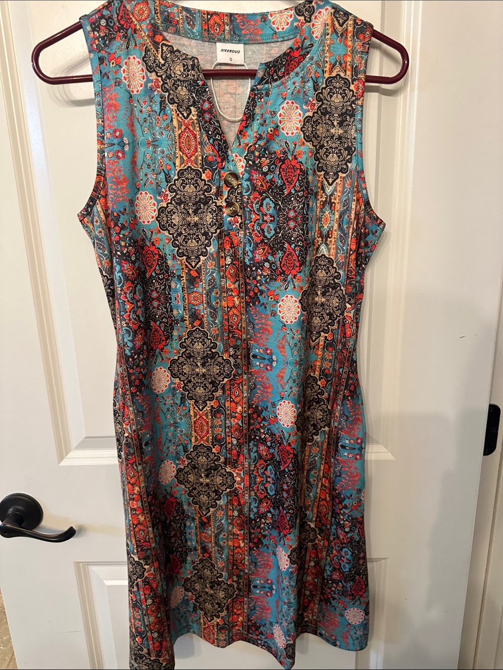 Avenue Sleeveless Turquoise Paisley Midi Dress with Coral and Black Accents